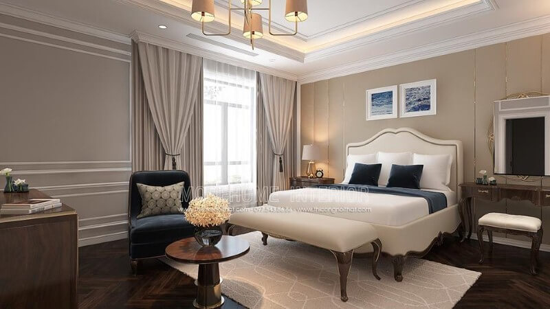 Giường ngủ tân cổ điển thanh lịch, quý phái với sắc trắng tinh khôi hòa quyện với đường nét mềm mại từ gỗ óc chó cao cấp tạo nên điểm nhấn ấn tượng cho phòng ngủ master. Thiết kế nội thất nhà phố