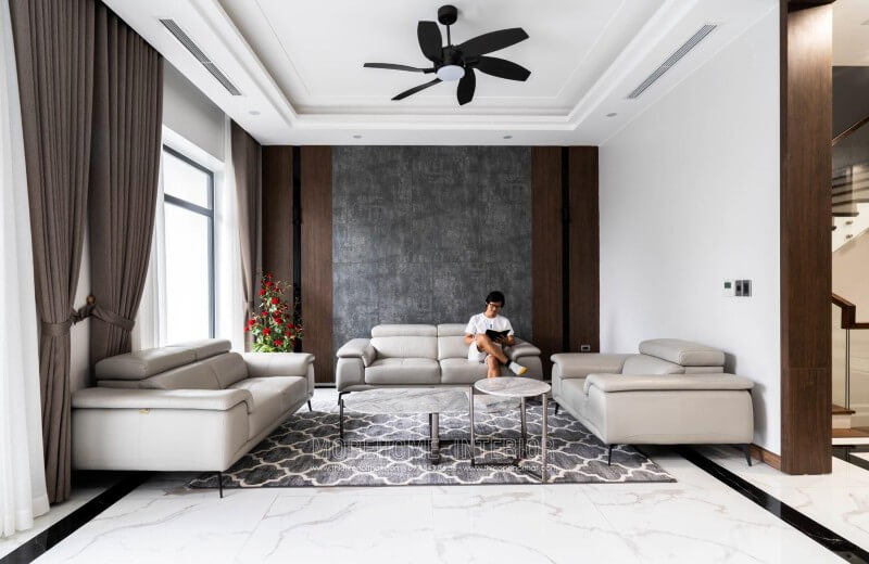 Công trình thi công nội thất phòng khách biệt thự hiện đại với đồ nội thất sofa bọc da sang trọng tại Nghệ An Thi công phòng đẹp, hiện đại và sang trọng