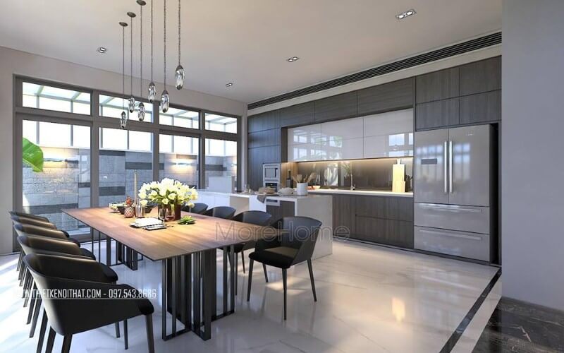 Bàn ghế ăn hiện đại đẹp sang trọng với sự kết nối đồng điệu giữa chiếc bàn gỗ chân sắt sang trọng cùng bộ 8 ghế sẫm màu. Thiết kế nội thất nhà phố